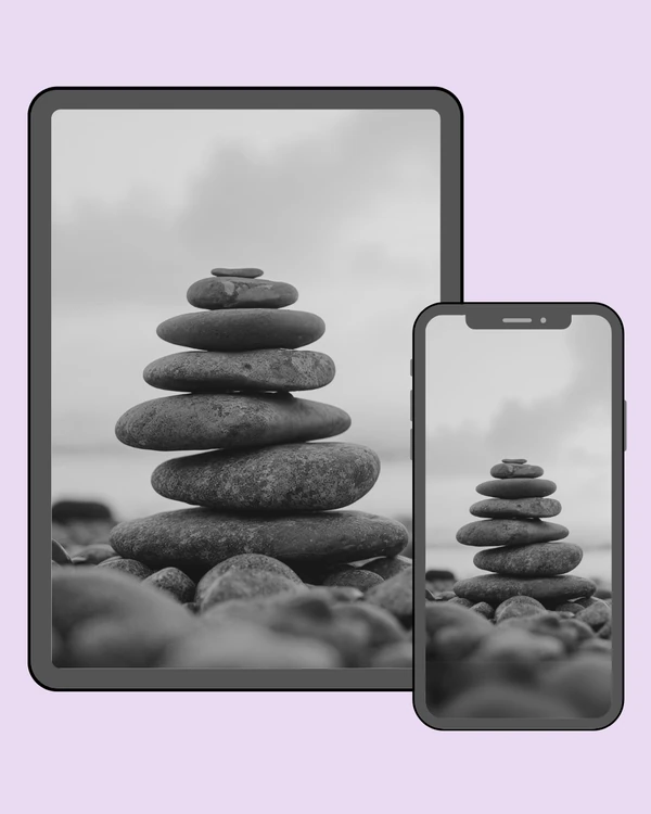 Dark balanced stones creating a calm minimalist composition