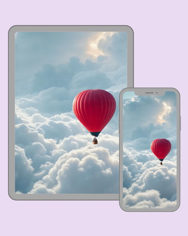 Red hot air balloon floating through luminous white clouds