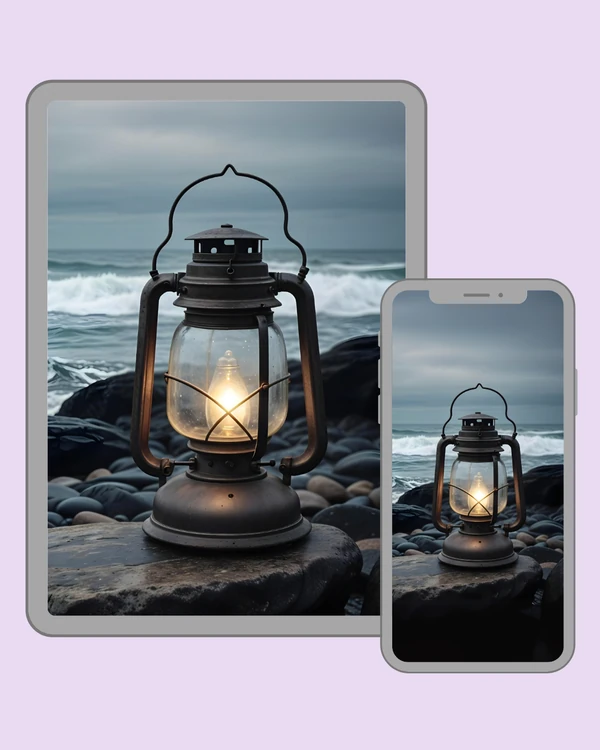 Glowing vintage lantern on a rocky shore beside a stormy sea