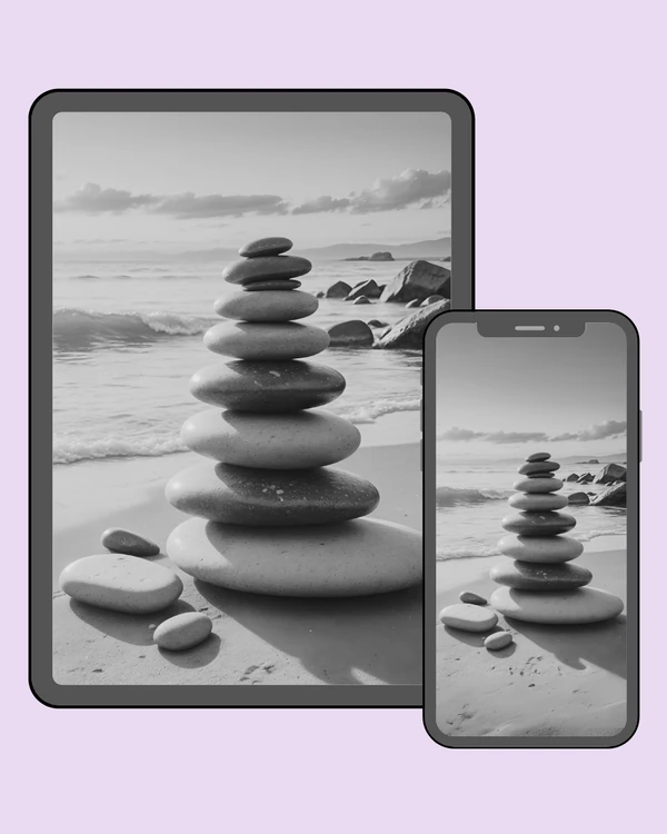 Balanced stone tower standing peacefully on a quiet beach